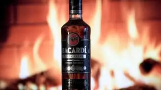 Bacardi Carta Negra against the backdrop of a fireplace | Dark rum and bright flame
