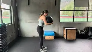 Slow Spinal Roll-Ups with Medicine Ball