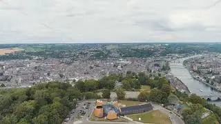 Namur, Belgium. Panorama of the central part of the city. River Meuse. Summer day. Stable. Aerial...