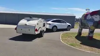 Tesla Model 3 tows a teardrop camper trailer, wow. Eco-friendly outdoor RV camping