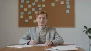 Young Man Writing In The Office | Free Stock Footage - No Copyright | 4K