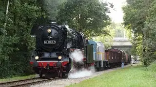 VSM 44 1593 sleept defecte 2412 en 2530 met goederentrein af 