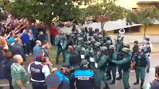 Enfrentamientos entre la Guardia Civil y los Mossos d'Esquadra durante el 1-O