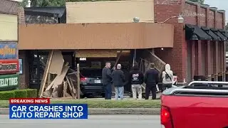 Driver hospitalized after crashing into auto repair shop in Schererville, Indiana: police