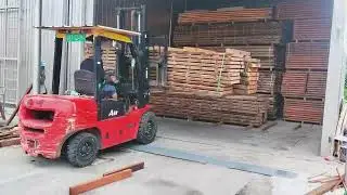 Forklift Loader Load Lumber into a Dry Kiln