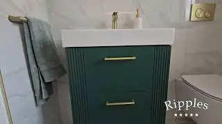 Marble bathroom with a touch of calmness. Green vanity have become the centre piece of 2026! 