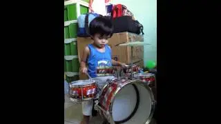 Baby yayan playing drums