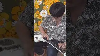 Playing Guitar with a Marble @cheez6750 #guitar #marble #music #awesome #shorts #amazing