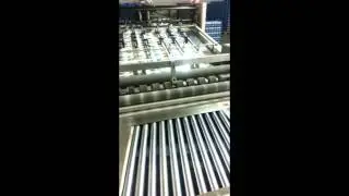 Playing cards slitting and collating machine