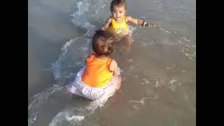 Babies 1st day out on beach in May 2019