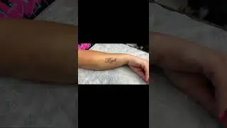 Elegant script name tattoo.  Clean lines, timeless style  #TattooArt #NameTattoo #symbolictattoos