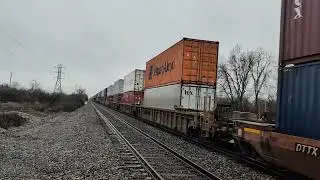 A trio of AC44C6Ms hauling a NS intermodal train.