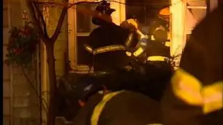 Firefighters battle house fire