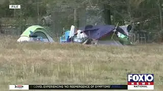 City trying to help with removal of homeless camp behind store in Tillman's Corner