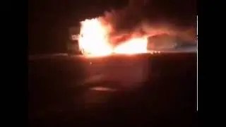 Car carrier on fire.