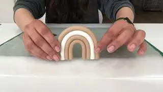DIY polymer clay coasters in a rainbow design