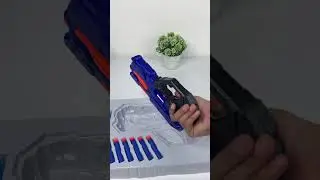 PISTOLA LANZADORA DE DARDOS BIOGEL CON PROTECCION 518D