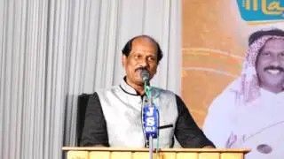 K.P.Jayan receiving Gulf Malayali Welfare Association Award