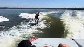9yo wake-surfing behind the Malibu 22 LSV