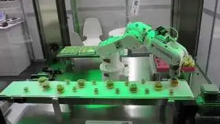 Robot using Piab suction cup and vacuum ejector at Fachpack