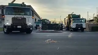 Waste Management Garbage Trucks Rolling out of the Yard