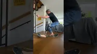AK amputee on indoor slagline