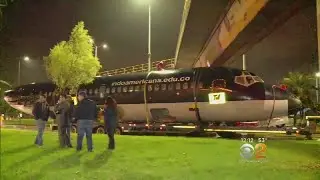 Airplane Gets Stuck Under Bridge In Colombia