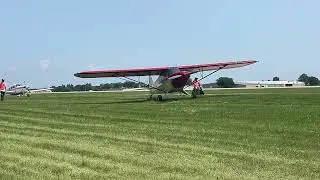 Piper PA-12 Super Cruiser taxis by at AirVenture July 22, 2024