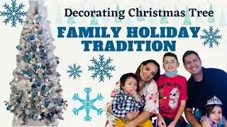 Decorating Christmas Tree / Family Holiday Tradition / White and Blue Christmas tree