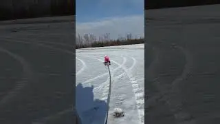 pulling Teagan on the snow Racer. #snow #ice #canada #homestead #atv #funny