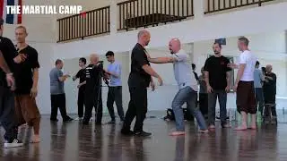 Adam Mizner and The Martial Man exchange at The Martial Camp