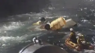 RNLI dramatically battles storm to salvage helicopter wreck after fatal crash in North Sea