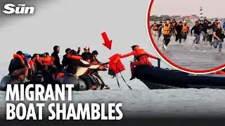 Shock moment French coastguard offers LIFE-JACKETS to migrants as small boat allowed to cross to UK