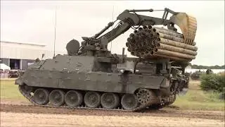 Trojan AVRE handling a pipe fascine bundle (based on Challenger 2 tank chassis)
