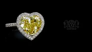 Leon Meg&eacute; right-hand ring featuring a heart-shaped fancy yellow diamond with micro pave halo r7038