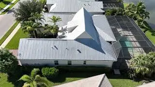 Naples Drone inspecting metal roof with exposed fasteners in Naples Reserve.