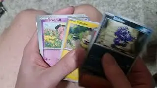 Opening pokemon cards on femboy thighs (sorry for the like razor burn)