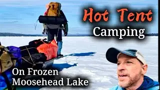 Hot tent winter camping on frozen Lake