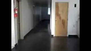 Running in to one another while holding giant rolls of bubble wrap in slow motion