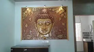 Buddha head with wall embossing designs