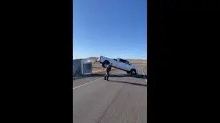 Trailer Flips On The Road And Then Smash The Tow Truck While They Try To Attach It