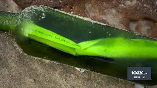 Woman throws message in a bottle into ocean, gets response