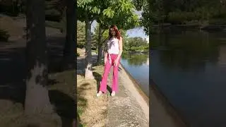 Walking in the sun with pink pants