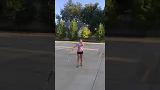 Twirling 2 baton flat toss neck rap