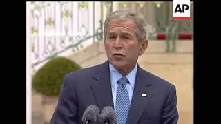 President Bush met with German chancellor Angela Merkel on Tuesday, pushing for solidarity against I
