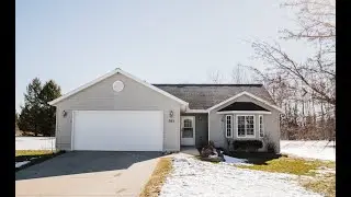A cozy 4 bedroom 3 bathroom family home in Traverse City, MI