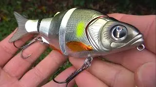 Crazy pike jumps out of water attacking Shad Alive fishing lure. Рыбалка щука атакует приманку