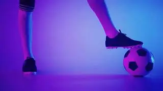 VideoVault Stock Video: Soccer player foot is on the ball