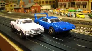 Slot Cars: Chevy El Camino vs Plymouth Superbird on Layout with B&O trains