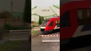 LINT-41 k&oslash;rer over jernbaneoversk&aelig;ring #train #model #modelrailway #railway #modeltrain #modeltrains
